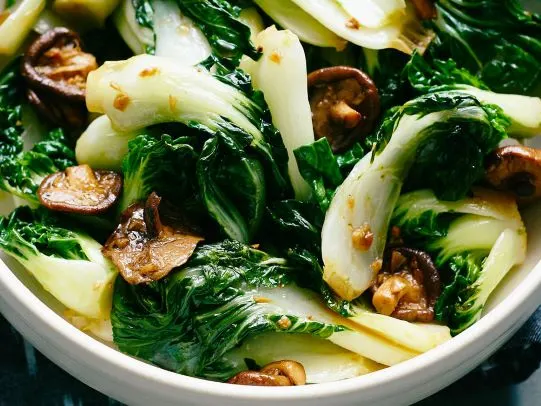 Bok Choy Pad Hed Horm — Stir fried baby bok choy with shiitake mushrooms.
