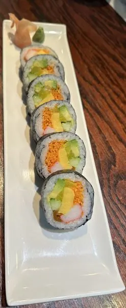 Futomaki Roll — Crabstick, tamago (sweet egg) and various vegetables, and rice in seaweed.