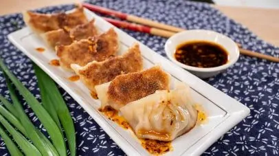 Gyoza — Deep-fried or steamed pork dumplings.