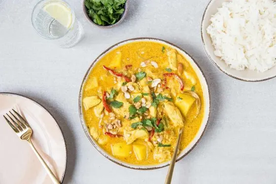 Kaeng Massaman — Massaman curry paste, coconut milk, potatoes, sweet onions, and roasted peanuts.