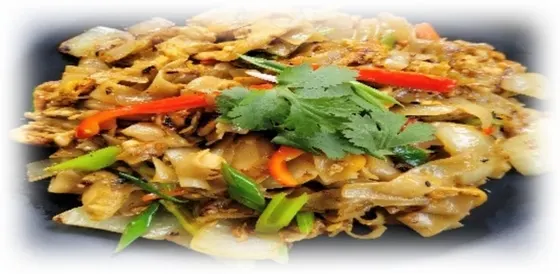 Pad Curry Powder Noodles — Stir-fried wide rice noodles with garlic, egg, onion, celery, sweet pepper and curry powder.