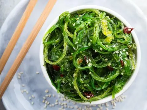 Seaweed Salad — Marinated seaweed, served cold.