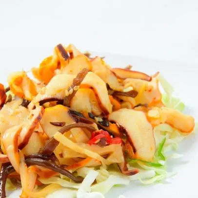 Squid Salad — Marinated cooked squid, served cold.