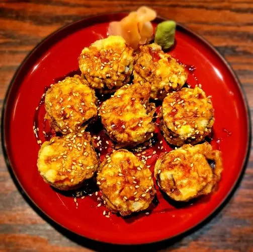 Deep-Fried Terminator Roll — Salmon and cream cheese roll, dipped in light tempura batter and deep-fried.