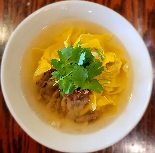 Wonton Soup — Pork wontons in a clear chicken broth with baby bok choy.